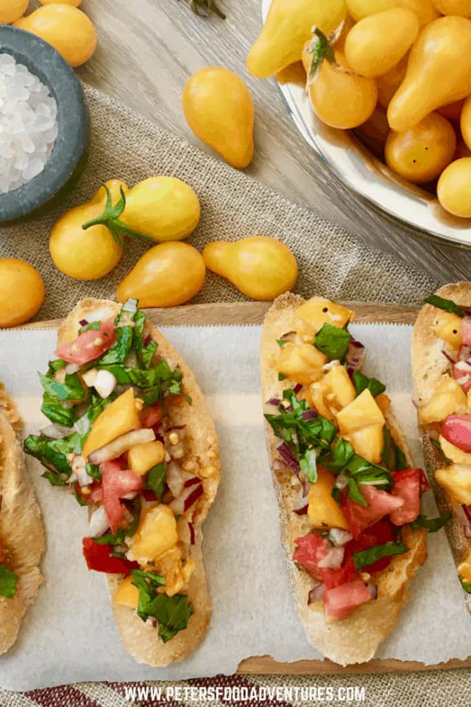The secret to making a delicious Summer Bruschetta is to use garden fresh ripe tomatoes. It's so easy to make, jam packed with flavour from garlic, onions basil and balsamic vinegar, This is the best bruschetta I've eaten! Bruschetta with Tomato & Basil