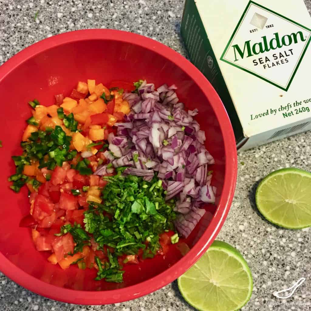 Easy made fresh salsa with chopped heirloom tomatoes, onions, jalapeños, cilantro and lime. Colorfully delicious! Perfect to dip nachos, tacos, fajitas or simply tortilla chips - Salsa Fresca - Pico de Gallo