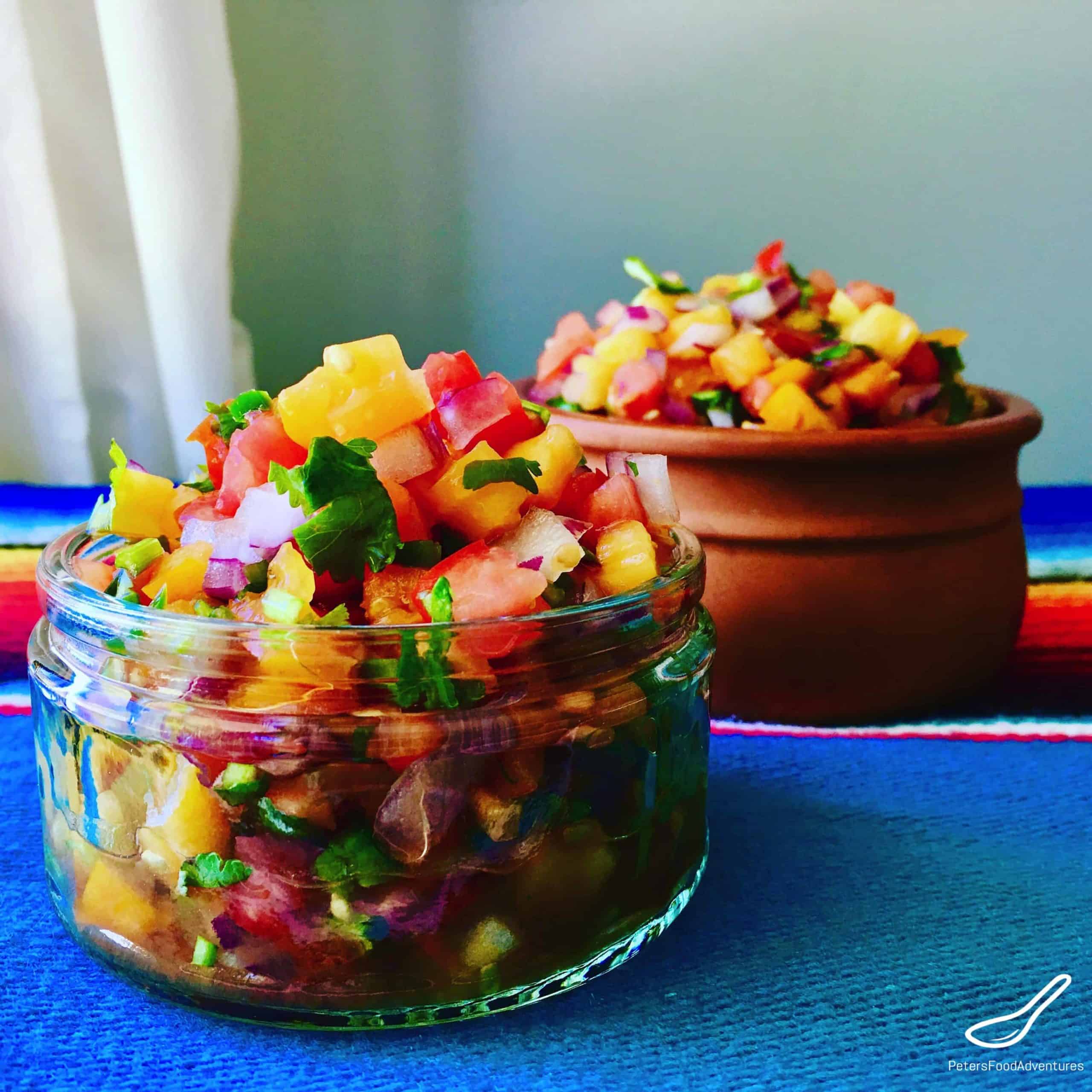 Easy made fresh salsa with chopped heirloom tomatoes, onions, jalapeños, cilantro and lime. Colorfully delicious! Perfect to dip nachos, tacos, fajitas or simply tortilla chips - Salsa Fresca - Pico de Gallo
