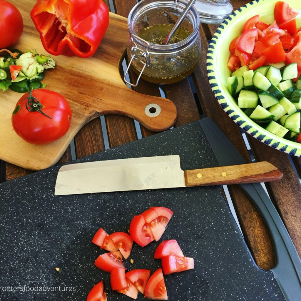 chopping tomatoes for salad