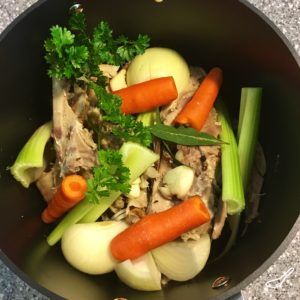 It's so easy to make a delicious turkey broth or turkey stock from leftover Christmas or Thanksgiving turkey. A bone broth full of nutrients, easy to freeze and full of flavor - Turkey Broth From Leftover Turkey