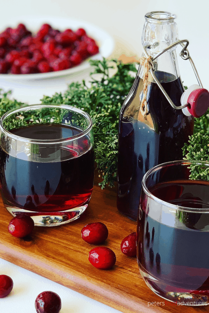 A homemade Cranberry Juice recipe that's delicious and refreshing. Made from whole cranberries, full of vitamins, sweetened with sugar or honey. A perfect summer drink, or holiday treat. Cranberry Mors Drink (морс)