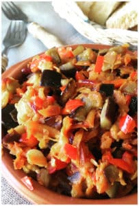 Russian Eggplant Caviar is a classic Russian spread made from eggplant (aubergines), carrot, peppers and tomatoes! Perfect on a piece of rye bread as an appetizer - (Баклажанная икра)