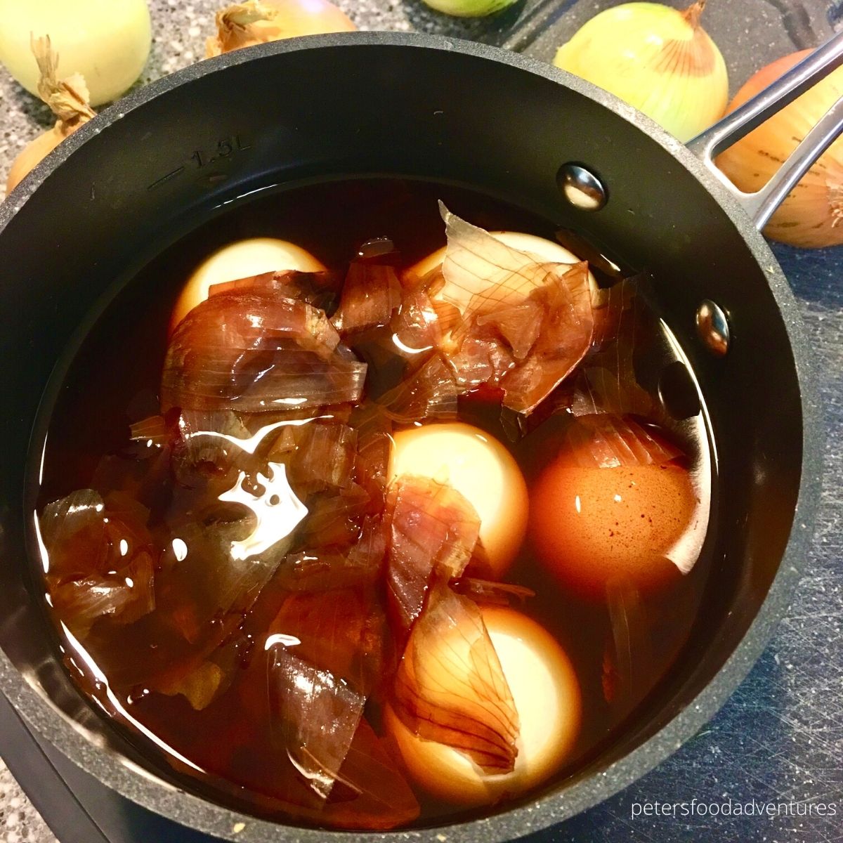 dying eggs onion skins in a pot