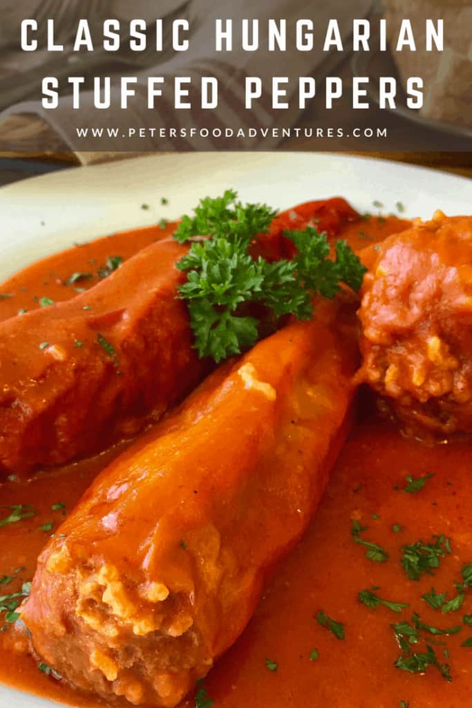 A Hungarian classic summer dish - paprika peppers with with ground beef, rice and paprika spice. Cooked in a delicious tomato passata sauce. Summer comfort food - Hungarian Stuffed Peppers (töltött paprika)