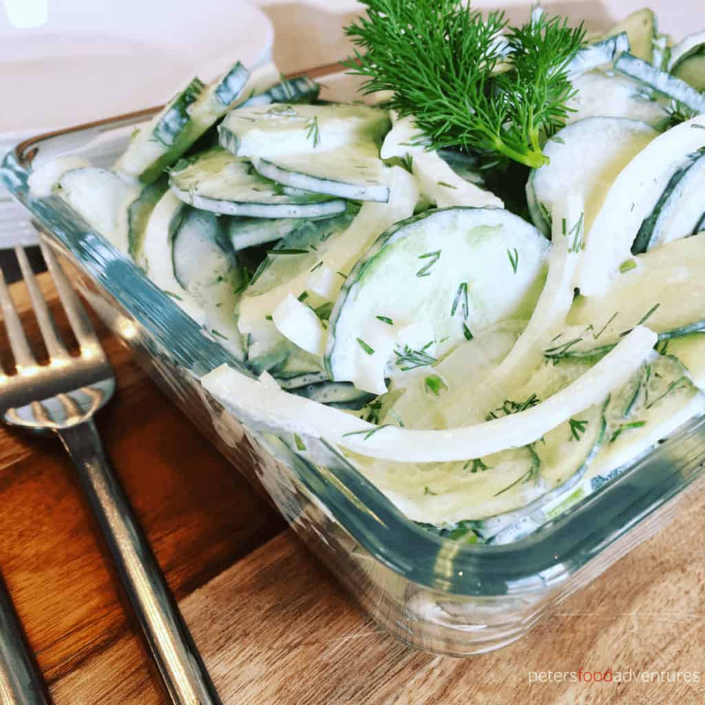 Mizeria - Creamy Cucumber Salad with sour cream is super easy to make, only takes minutes, and so delicious. This Eastern European classic with cucumbers, sour cream, fresh dill and onions is a perfect summer salad.
