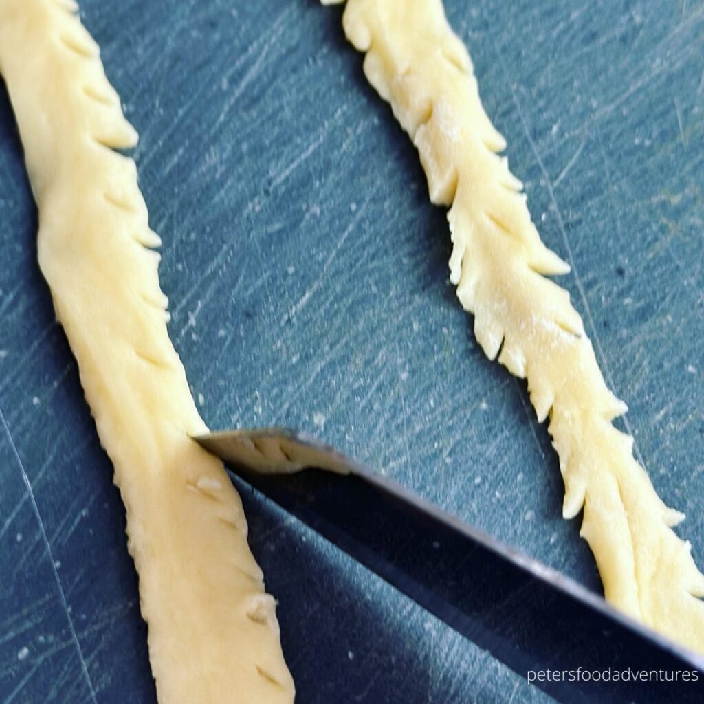 snipping dough ribbons