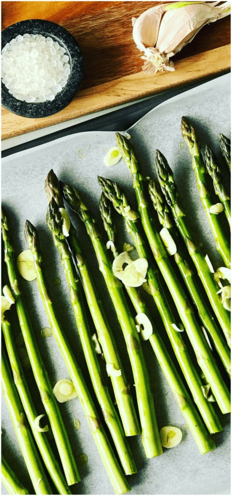 Roasted Asparagus with Garlic is such a healthy and easy side dish to make. Drizzle generously with Olive oil and toss with garlic pieces, the perfect side dish! Garlic Roasted Asparagus Recipe