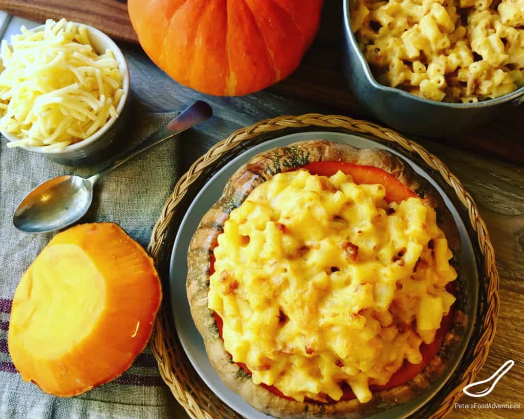 Baked Pumpkin Mac and Cheese with Bacon is easy to make, super cheesy and a healthier way to enjoy this American Dinner favorite. A perfect fall comfort food, especially around Halloween.