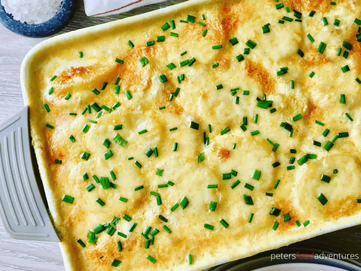 Potato Bake with French Onion Soup is creamy, cheese scalloped potato casserole that only uses 4 ingredients. So easy to make, yet packed full of flavor