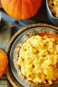 Baked Pumpkin Mac and Cheese with Bacon is easy to make, super cheesy and a healthier way to enjoy this American Dinner favorite. A perfect fall comfort food, especially around Halloween.