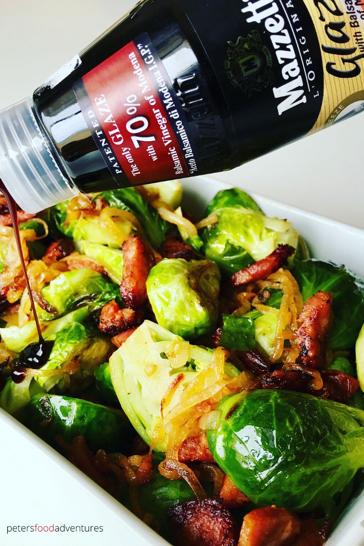 pouring Balsamic glaze over Brussels sprouts