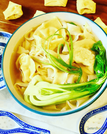 Authentic Wonton Noodle Soup recipe made with fresh wonton wrappers, chicken, ginger and garlic. Easy step by step instructions on wonton making, a healthy lunch or dinner and tasty Asian soup recipe. Chinese Chicken Wonton Noodle Soup Recipe