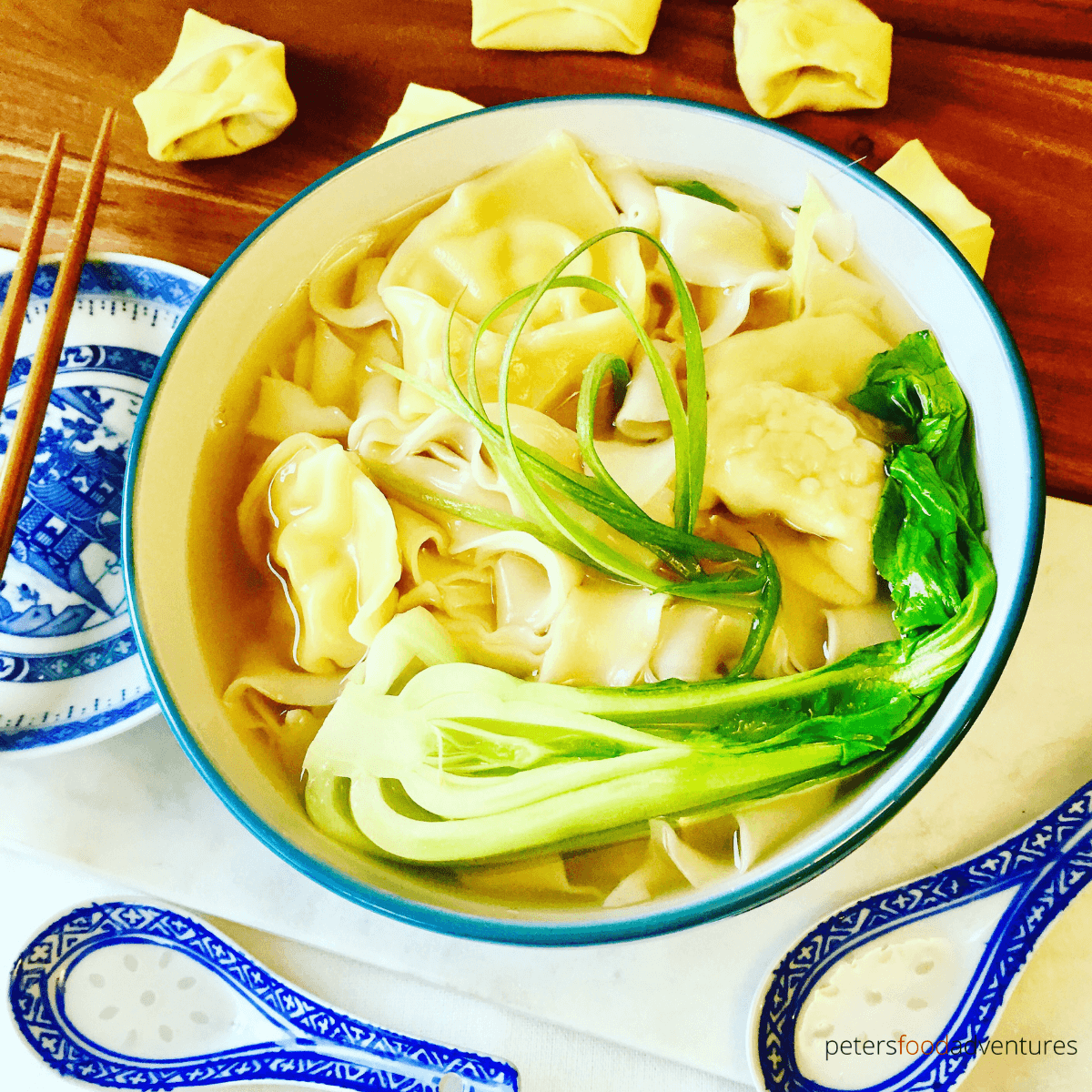 Authentic Wonton Noodle Soup recipe made with fresh wonton wrappers, chicken, ginger and garlic. Easy step by step instructions on wonton making, a healthy lunch or dinner and tasty Asian soup recipe. Chinese Chicken Wonton Noodle Soup Recipe