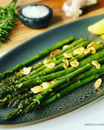roasted garlic asparagus on a platter