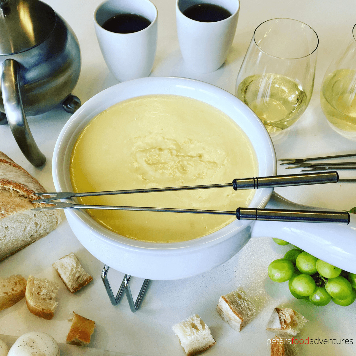 This classic Swiss Cheese Fondue Recipe is perfect for the ultimate night in! Perfect for a romantic evening, or hosting a fondue party or just warming up after a day of skiing. An easy appetizer that's simple make.
