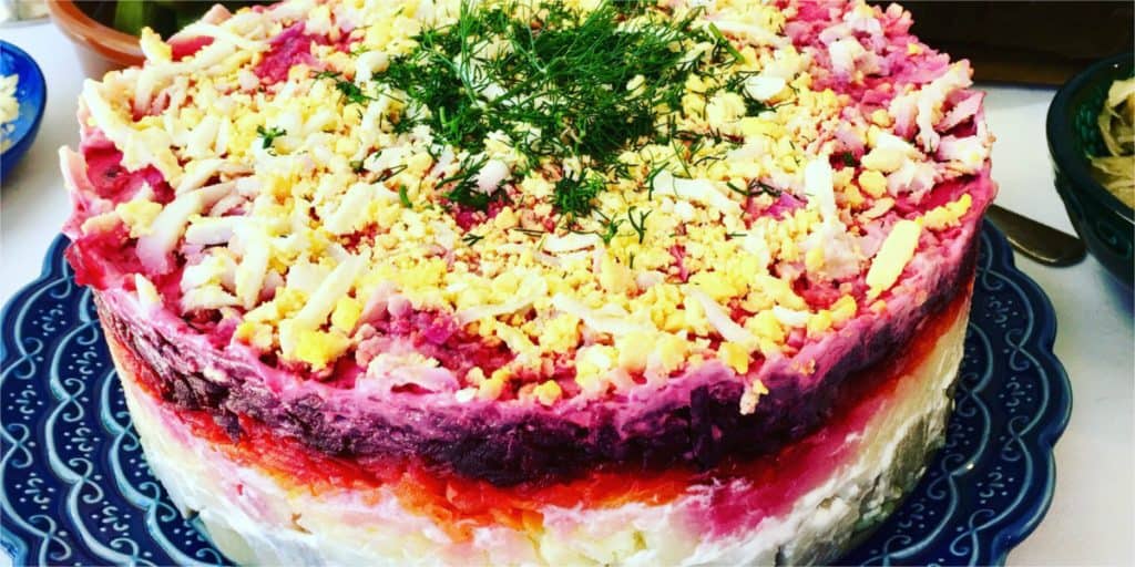 A classic Russian winter recipe, popular especially during New Year celebrations. A layered salad with beets, potatoes, carrots, eggs, herring and lots of mayonnaise! It's like a crazy potato salad! - Shuba Salad or Herring Under a Fur Coat (Селёдка под шубой)