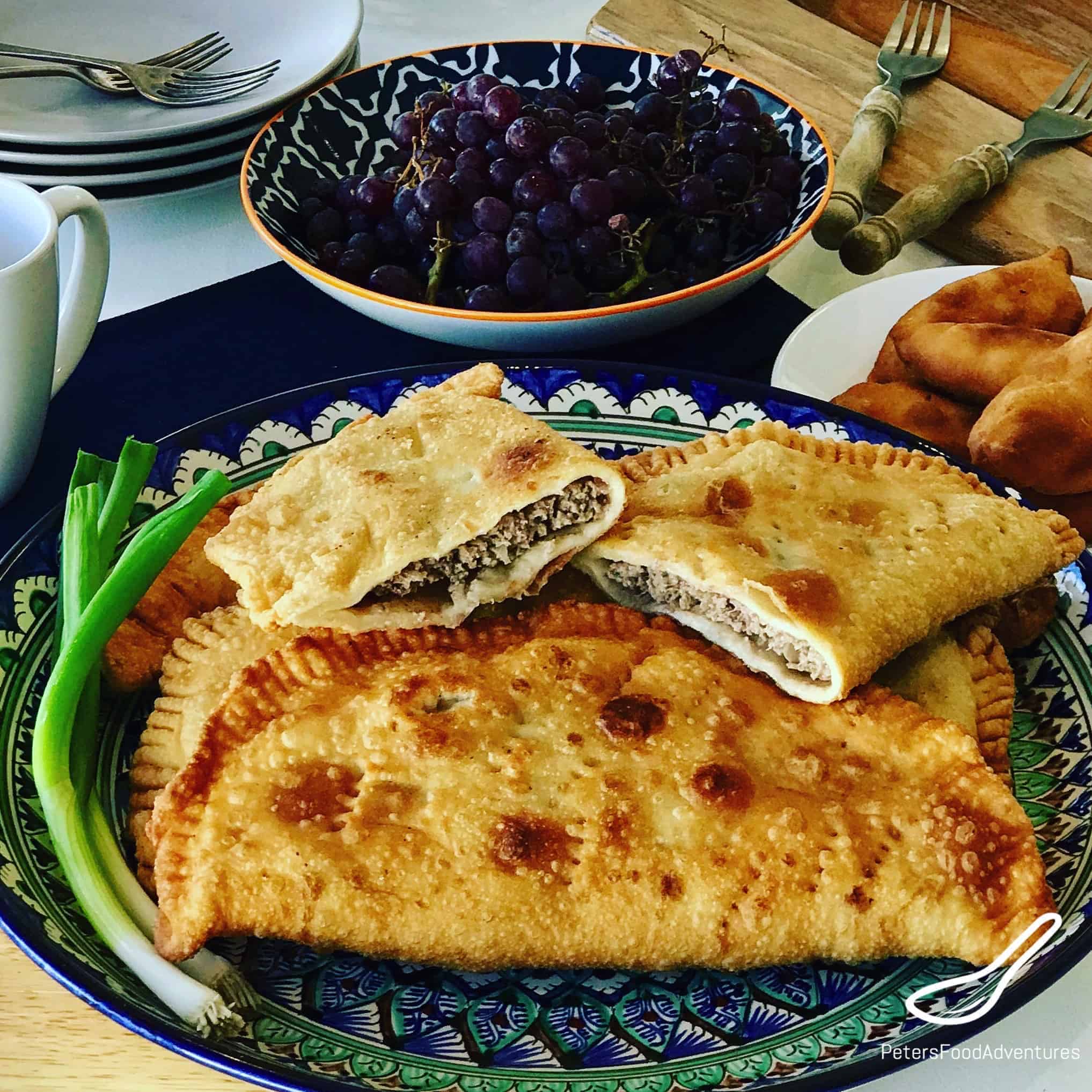 Chebureki are a classic Crimean, Caucasus and Turkic street food snack, popular across Russia and the former Soviet Union. Crispy outside, juicy inside, so easy to make, an authentic recipe! Chebureki (Чебуреки)