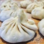 You've got to try Georgian Khinkali (Хинкали). Popular in Russia and across the former Soviet Union. Broth filled meat dumplings mixed with Cilantro, Blue Fenugreek, Cumin and more! Khinkali Recipe (Хинкали)