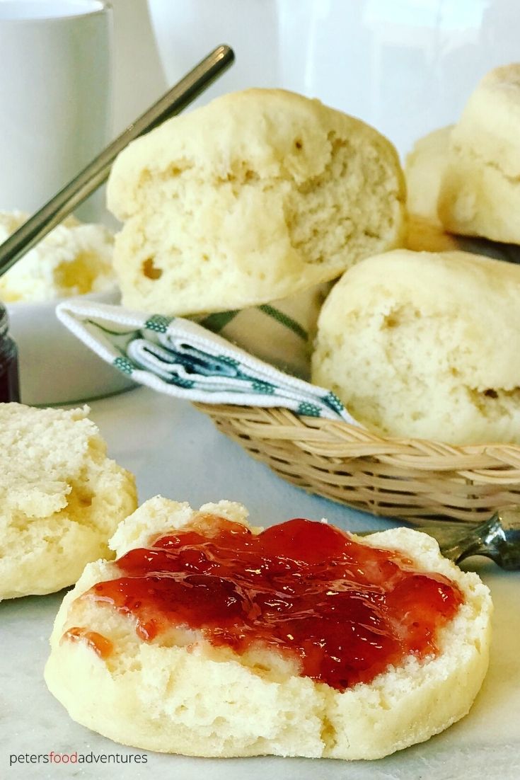 scones covered with jam for breakfast