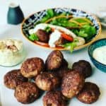 Lamb Patties in Pita Bread with salad is delicious summer meal or appetizer. It's like a small lamb burger, lamb meatball or lamb rissoles. Perfect as a lamb pita pocket or a lamb slider for lunch.