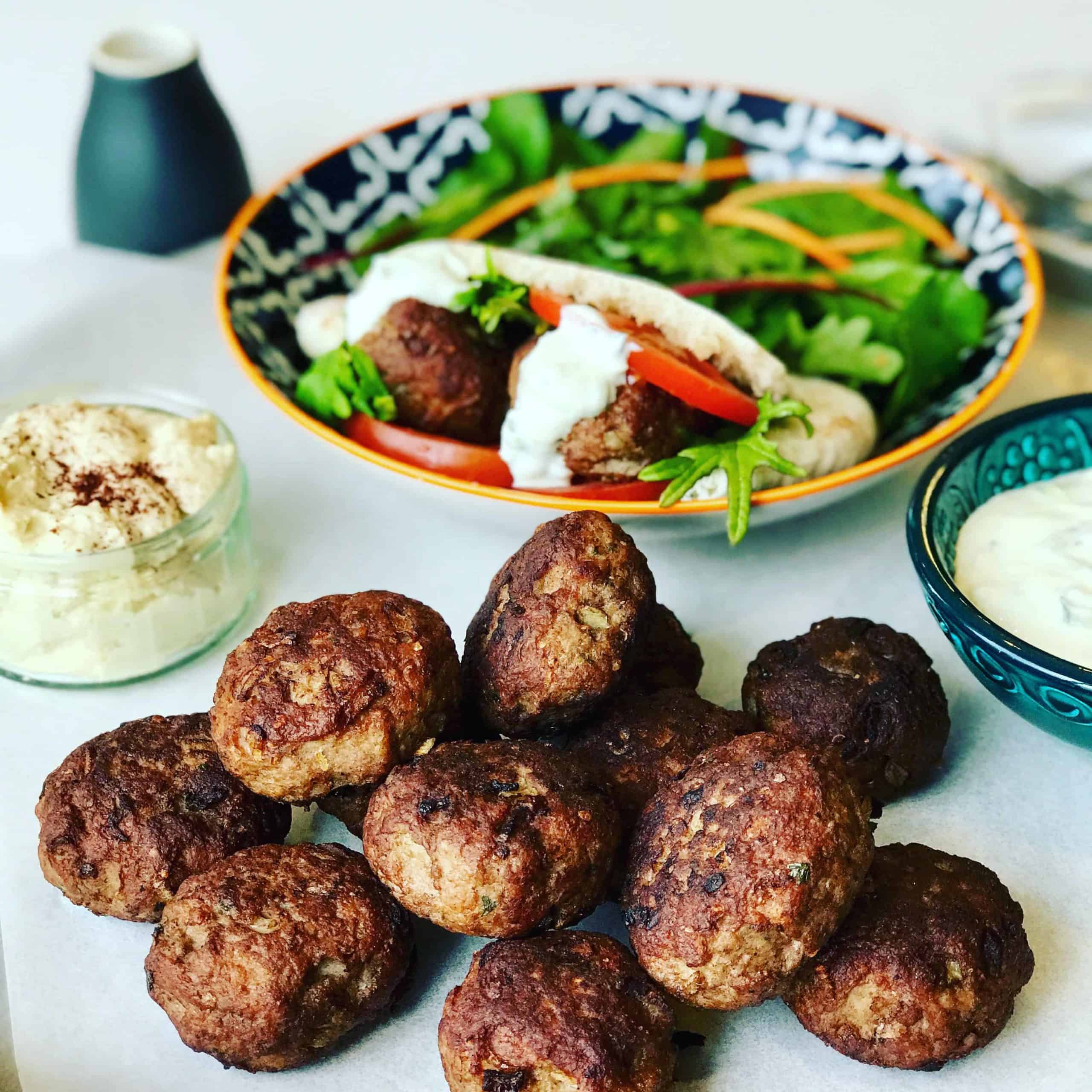 Lamb Patties in Pita Bread with salad is delicious summer meal or appetizer. It's like a small lamb burger, lamb meatball or lamb rissoles. Perfect as a lamb pita pocket or a lamb slider for lunch.