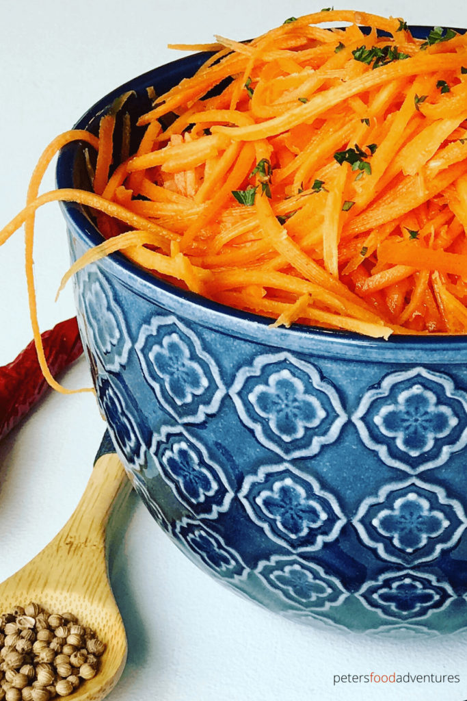 An easy Carrot Salad recipe from Russia called Morkovcha, with roots of Korean immigrants. Thinly julienned carrots with garlic, vinegar, spices and onions in hot oil. A family favorite.