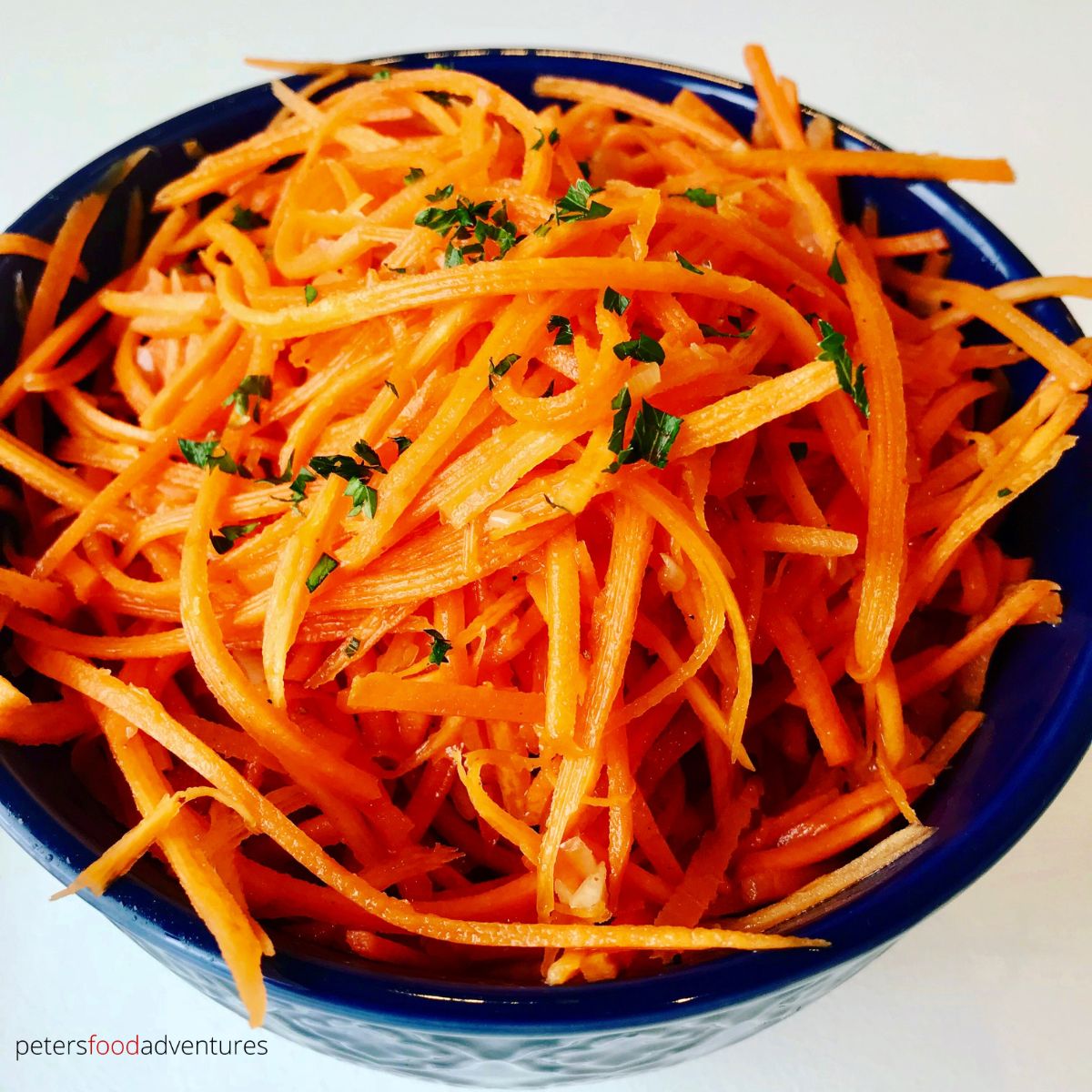 sliced carrot salad in bowl