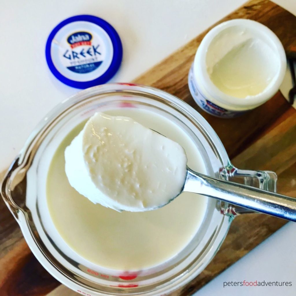spoon of yogurt into whipping cream