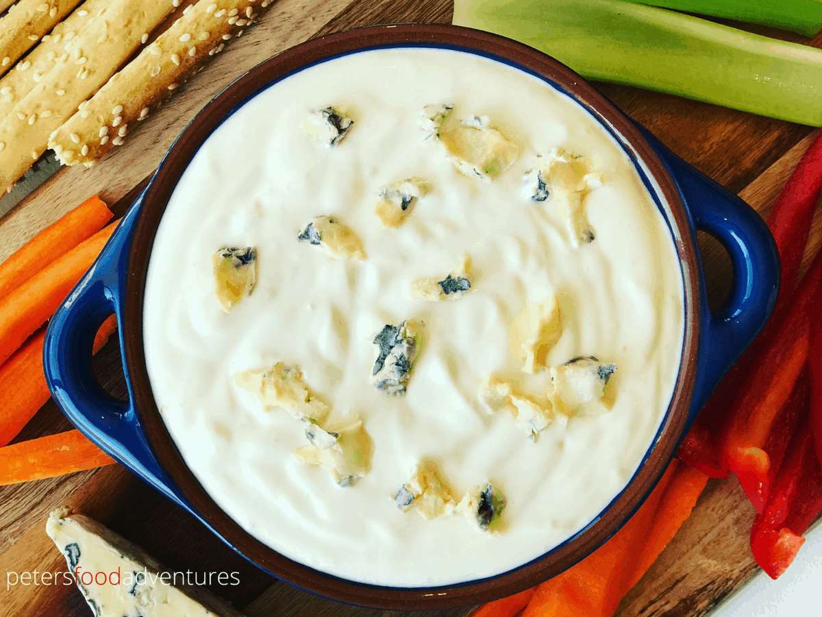 Homemade Blue Cheese Dip that's so easy to make. An awesome Super Bowl snack, perfect for dipping buffalo wings, celery sticks, vegetables and crackers. Delicious creamy, tangy chunky Bleu Cheese dip.