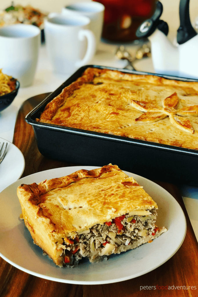 This Beef Pirog recipe is made with potatoes, red peppers, carrots and green onions. One of the many styles of Pirog recipes your family can enjoy for dinner. Yeast free recipe, or can be made with puff pastry or a yeast dough. Everyone loves a meat pie!