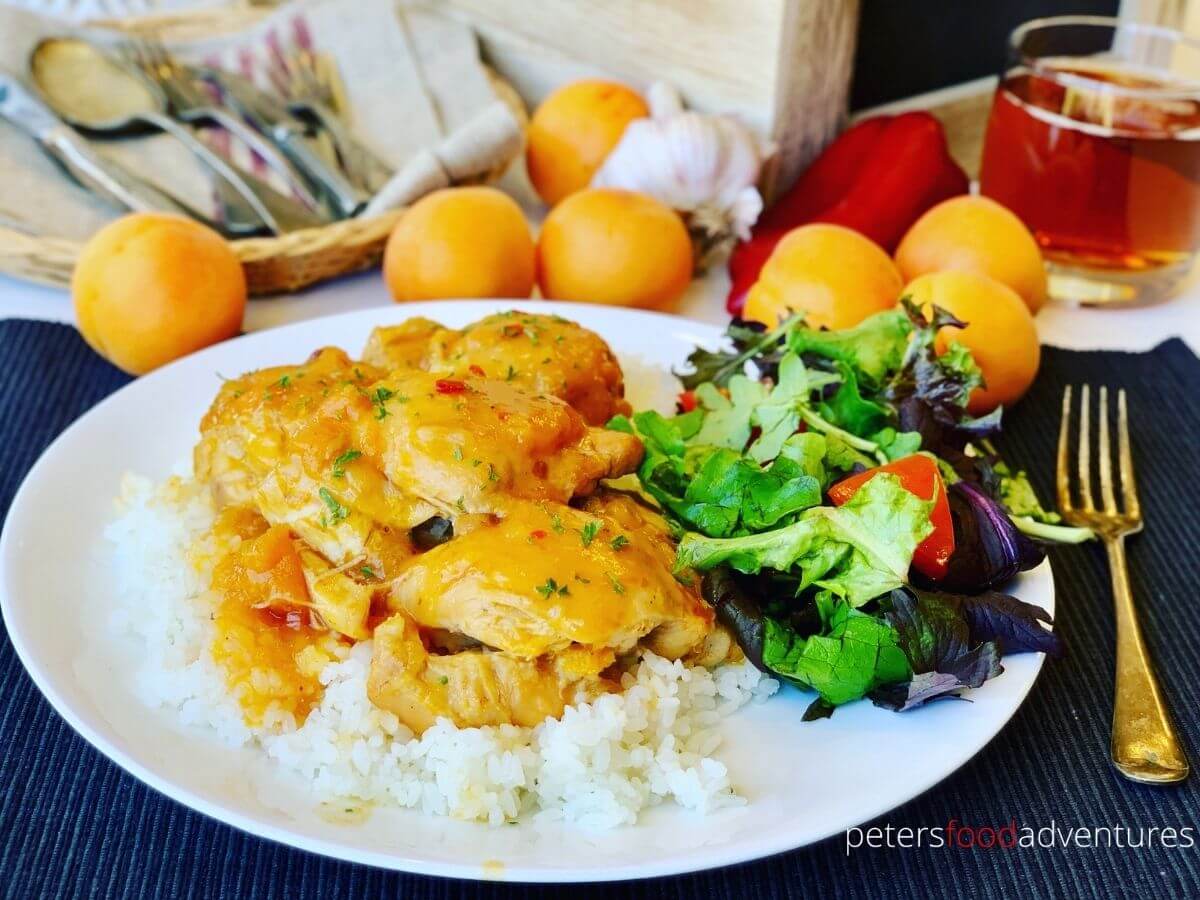 apricot chicken on a plate with salad