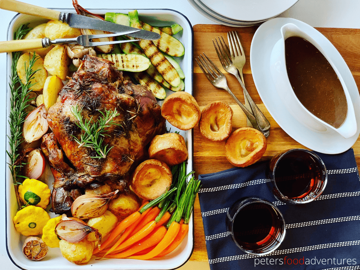 Slow Roast Leg of Lamb recipe, perfect for a Sunday Roast, an Easter Lamb lunch, or for dinner tonight. Roast Lamb with pierced with fresh rosemary and garlic, roasted with vegetables.