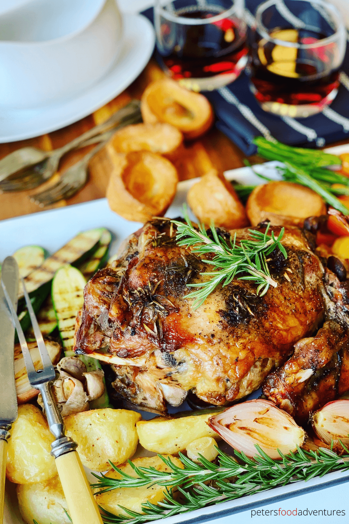 Slow Roast Leg of Lamb recipe, perfect for a Sunday Roast, an Easter Lamb lunch, or for dinner tonight. Roast Lamb with pierced with fresh rosemary and garlic, roasted with vegetables.