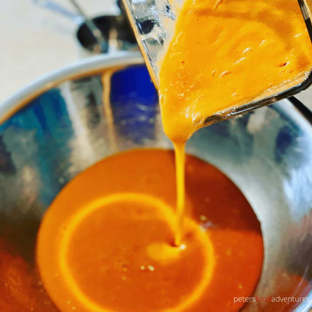 fruit leather puree pouring into a bowl
