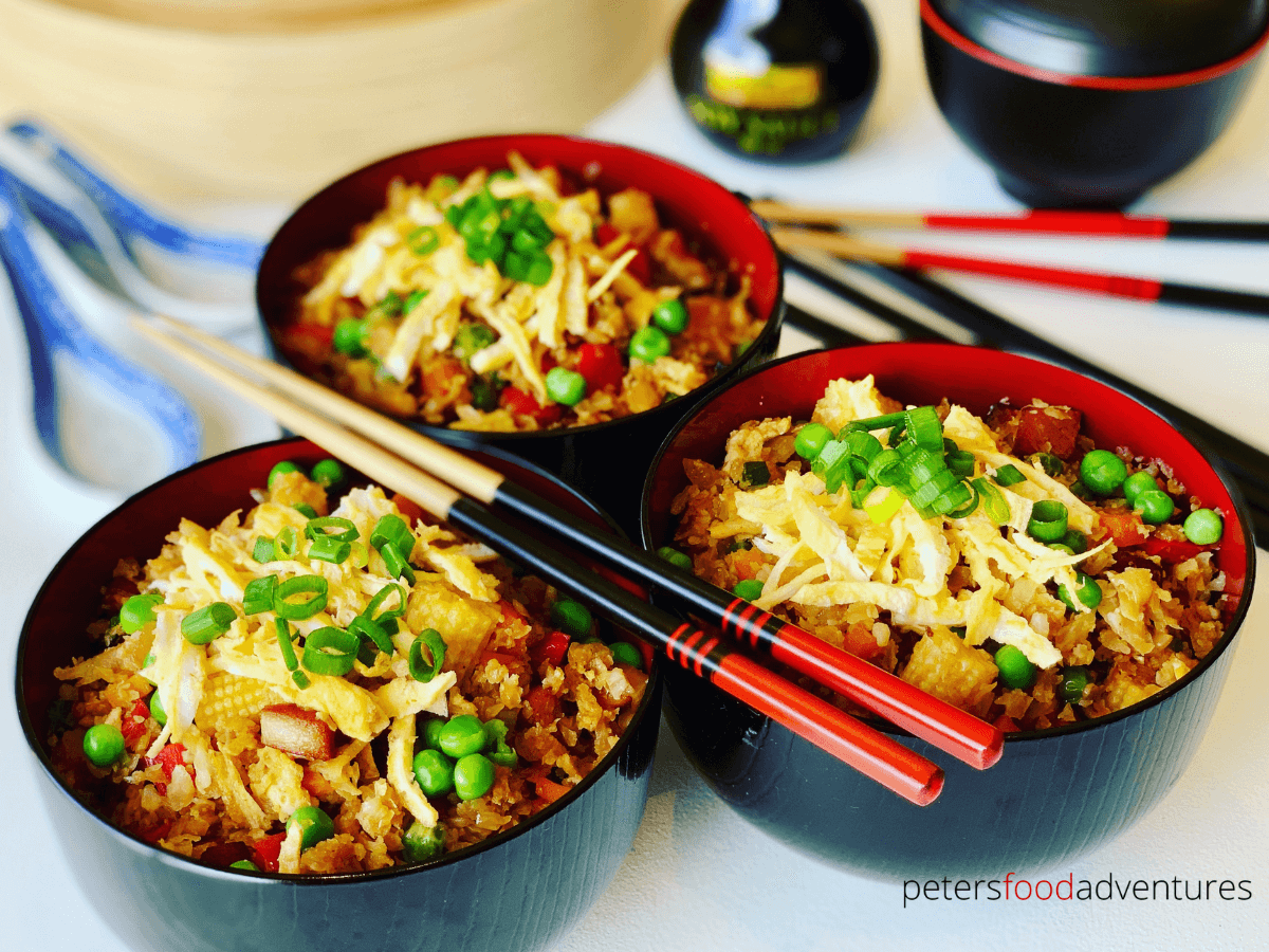 Cauliflower Fried Rice recipe is low carb, keto and delicious. An easy way to sneak in vegetables to your dinner plate. Perfect as a side dish, or as your dinner main. Packed with classic fried rice vegetables like red peppers, peas, carrot and baby corn.