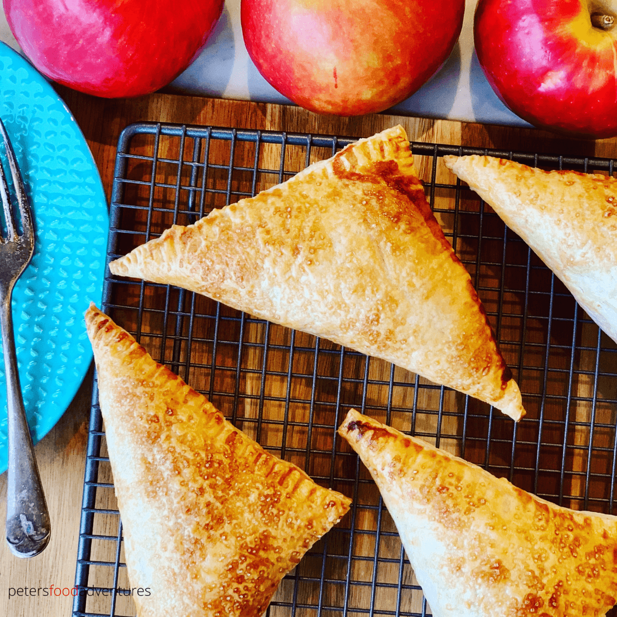 Apple Turnovers with Puff Pastry are an autumn favorite, easy to make apple hand pies. Perfect way to use up apples during harvest. Made with puff pastry, freeze them for later, or drizzle them with a cream cheese icing. Perfect for breakfast or for dessert!