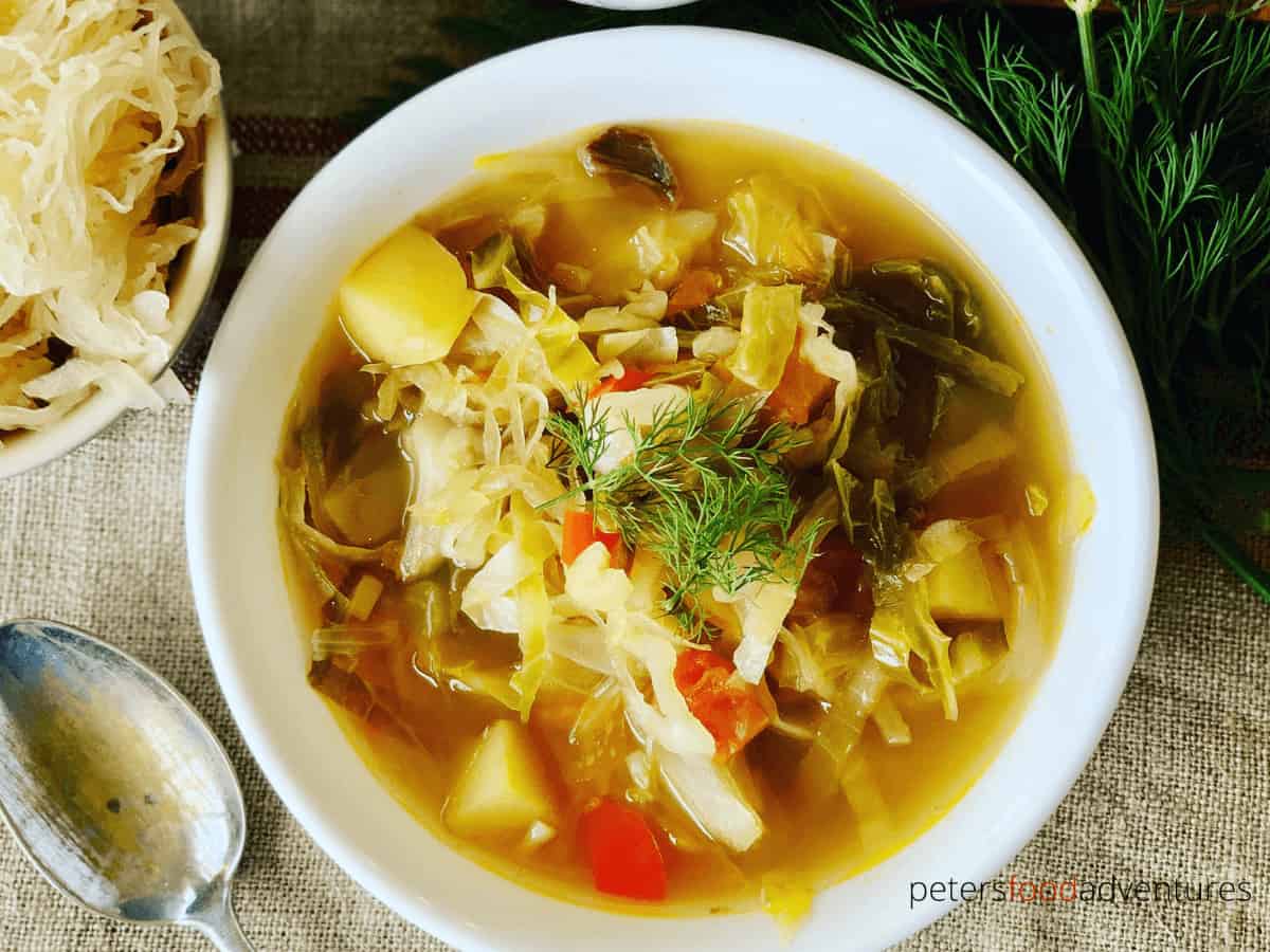 Instant Pot Cabbage Soup - Russian Style! A hearty meal made with Beef Bone Broth, cabbage, sauerkraut, potato and dill. A one pot comfort food dinner your whole family will love. Serve with sour cream and dark rye bread.