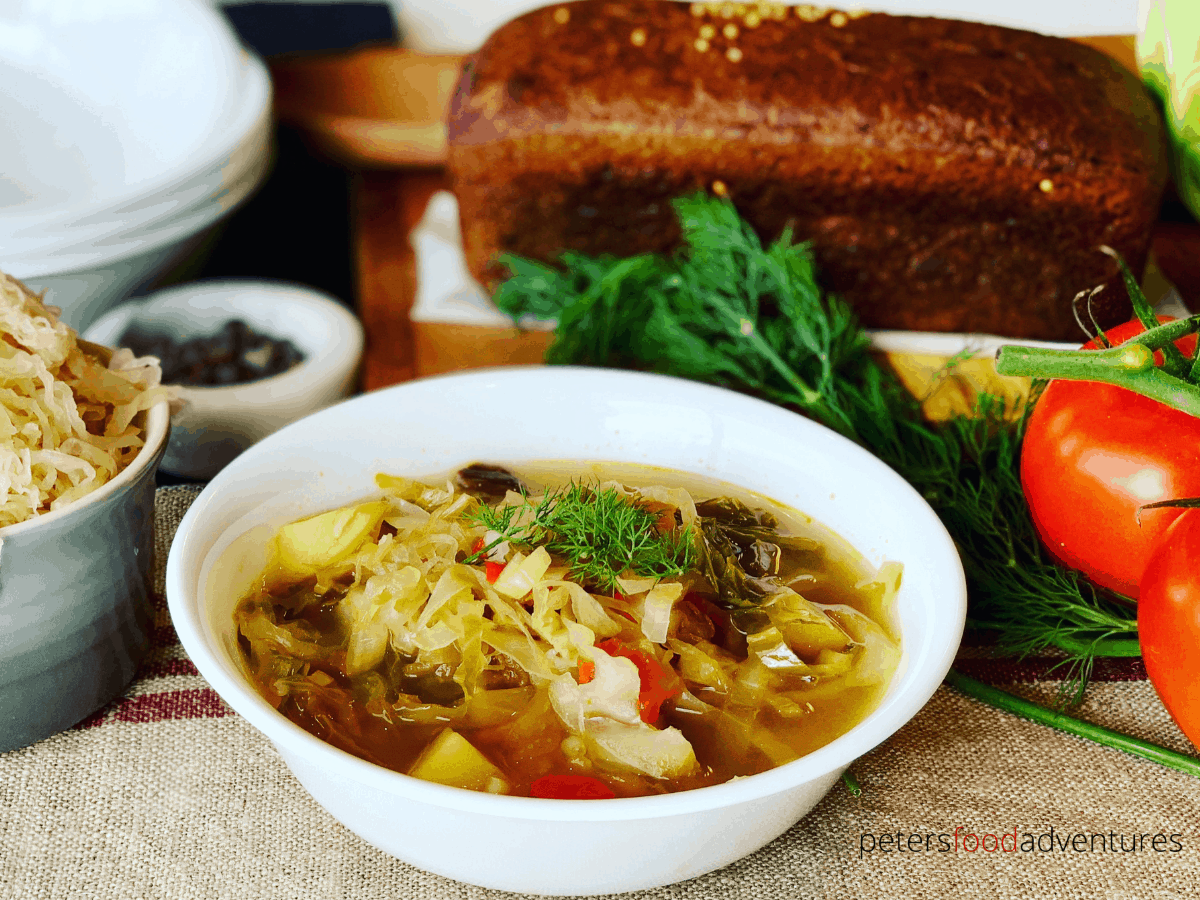 Instant Pot Cabbage Soup - Russian Style! A hearty meal made with Beef Bone Broth, cabbage, sauerkraut, potato and dill. A one pot comfort food dinner your whole family will love. Serve with sour cream and dark rye bread.