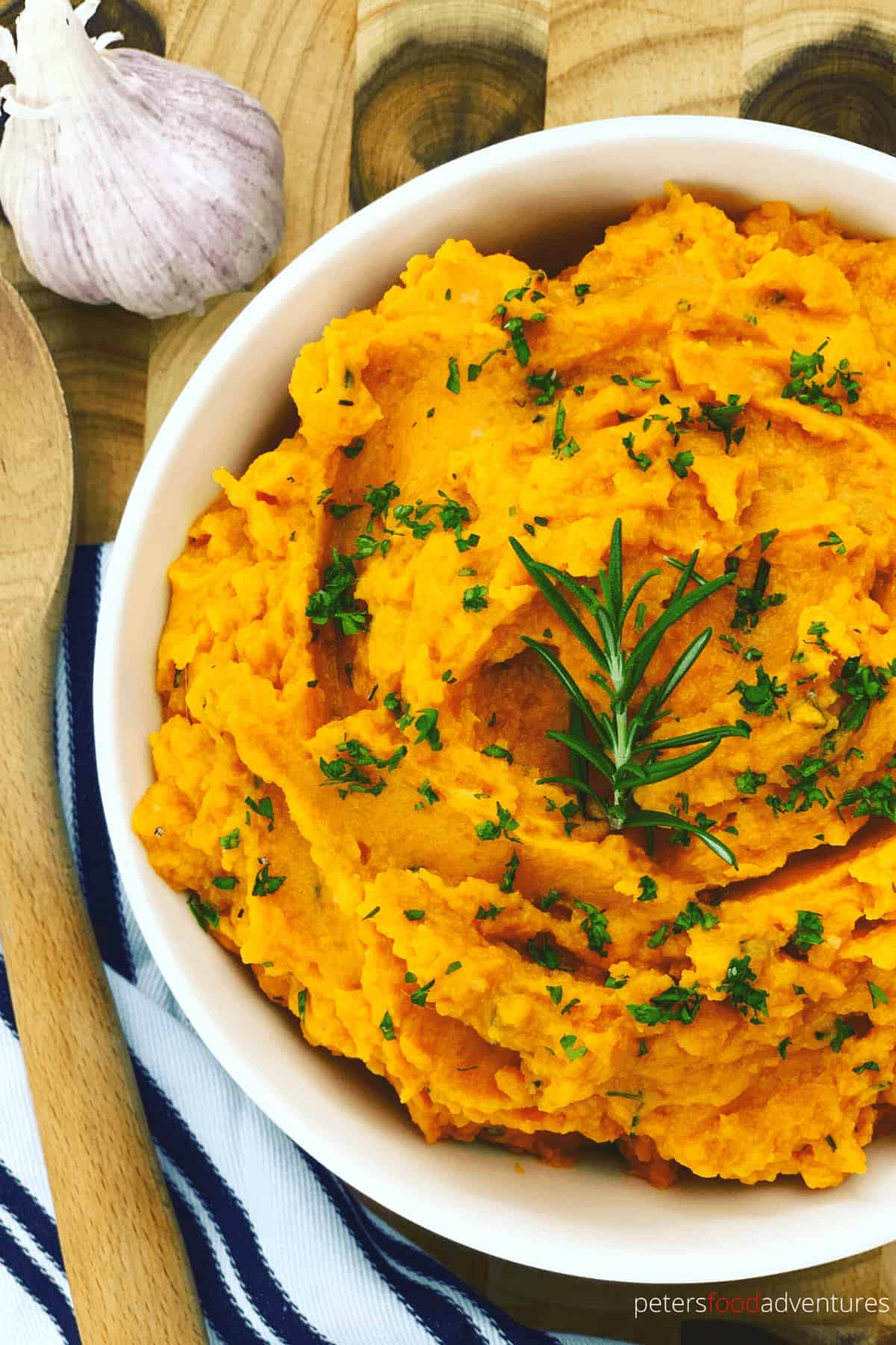 Smooth and creamy Mashed Sweet Potatoes are the perfect side dish for dinner, Thanksgiving or Christmas. Packed with flavor from fresh rosemary and garlic, quick, easy and healthy.