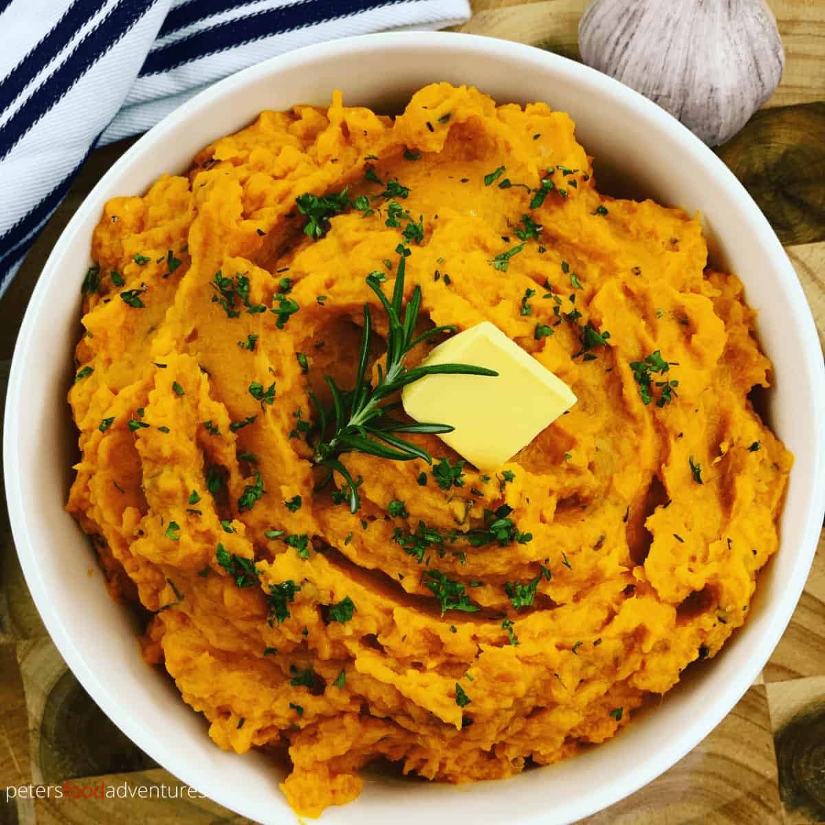 Smooth and creamy Mashed Sweet Potatoes are the perfect side dish for dinner, Thanksgiving or Christmas. Packed with flavor from fresh rosemary and garlic, quick, easy and healthy.