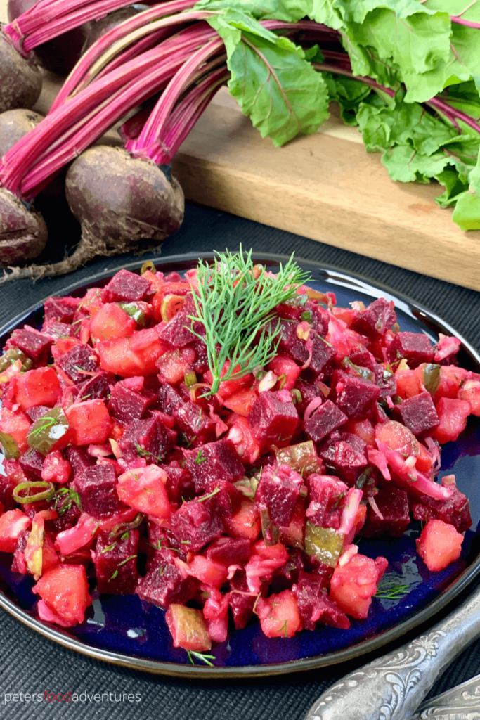 A classic Vinegret, a Beet and Potato Salad, popular across Eastern Europe. A healthy, hearty and delicious salad with beets, potatoes, carrots, pickled cabbage, dill and pickles. Vegan and gluten free, tastes even better the next day! Vinegret Salad