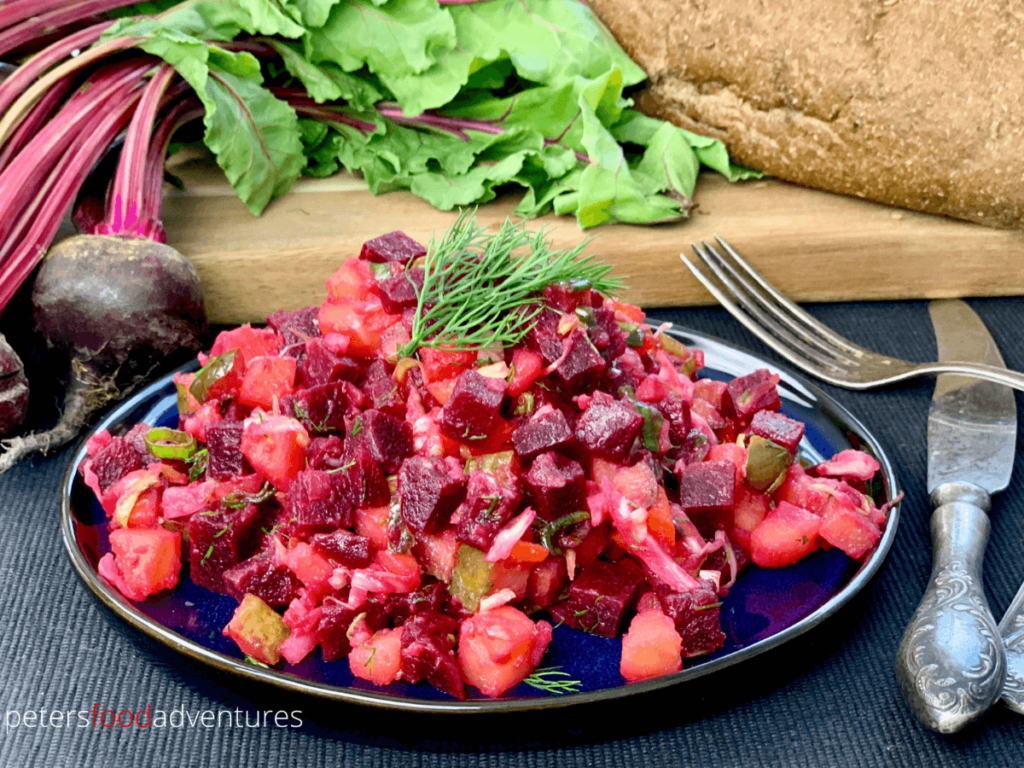 A classic Vinegret, a Beet and Potato Salad, popular across Eastern Europe. A healthy, hearty and delicious salad with beets, potatoes, carrots, pickled cabbage, dill and pickles. Vegan and gluten free, tastes even better the next day! Vinegret Salad