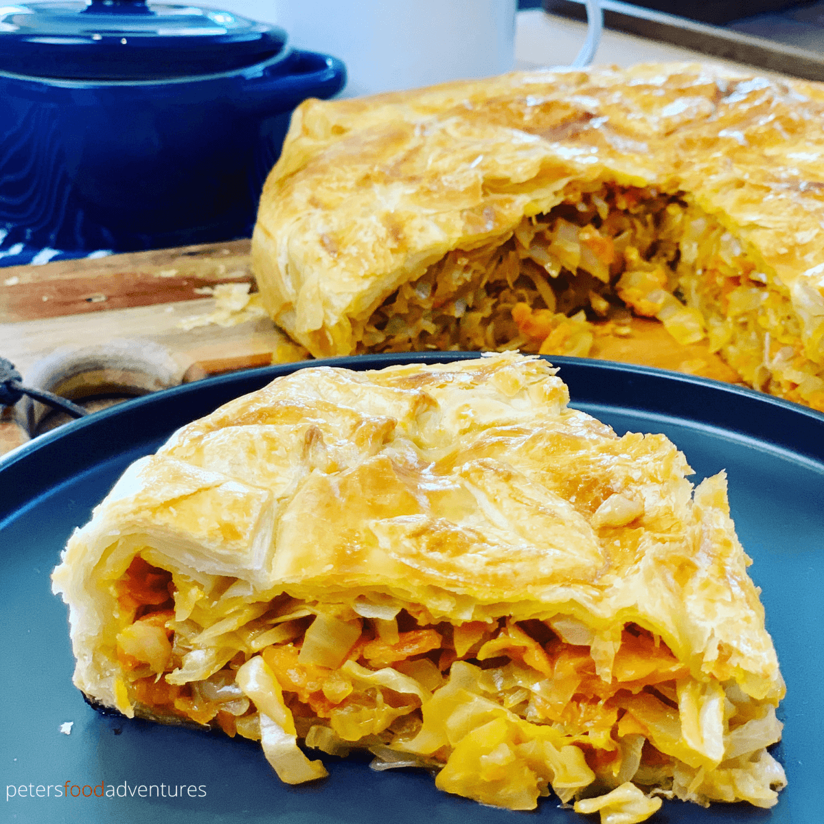 A Russian Cabbage Pie that is easy to make using a puff pastry shortcut. Stuffed with butter braised cabbage. A tasty vegetarian meal that’s perfect for lunch or dinner!