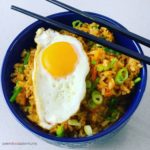 bowl of korean fried rice with a fried egg