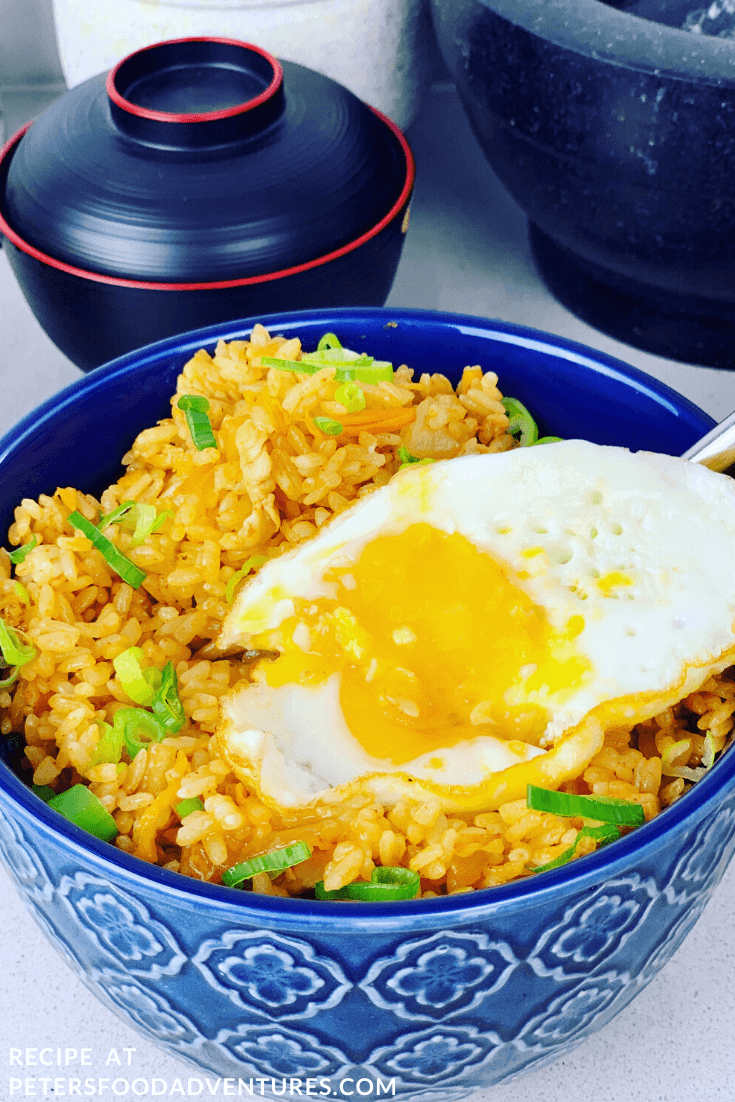 bowl of kimchi fried rice with a fried egg