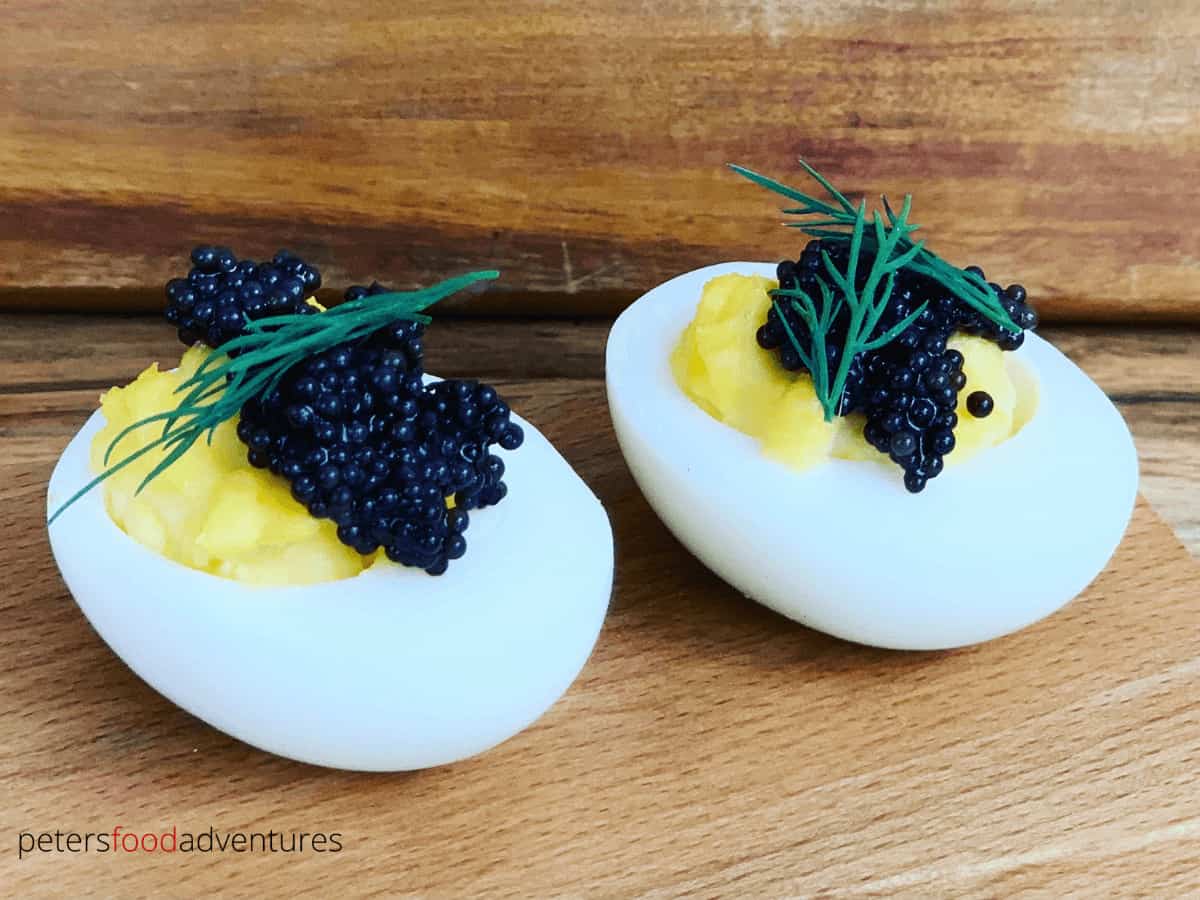 black caviar served on devilled eggs