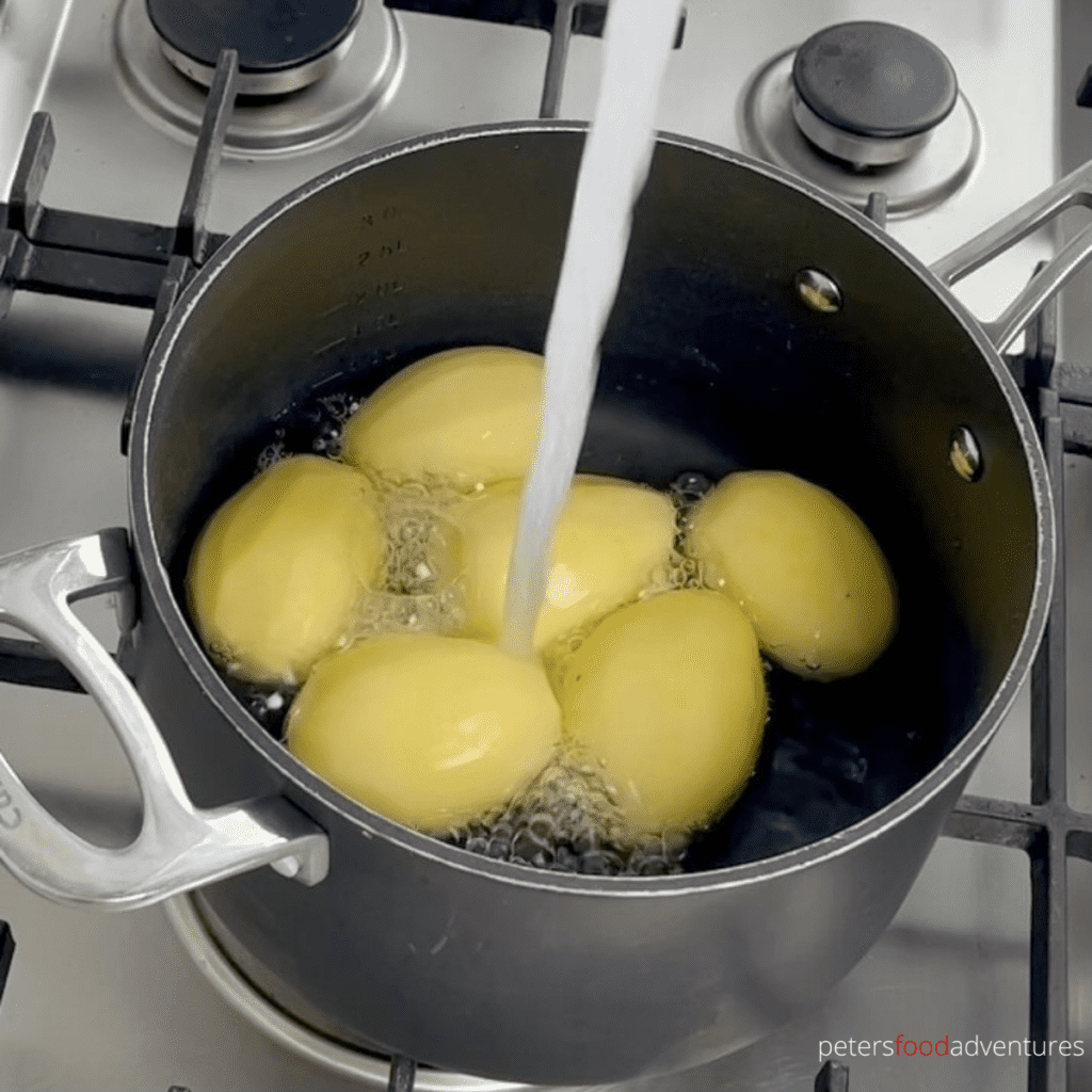pouring water for boiling potatoes