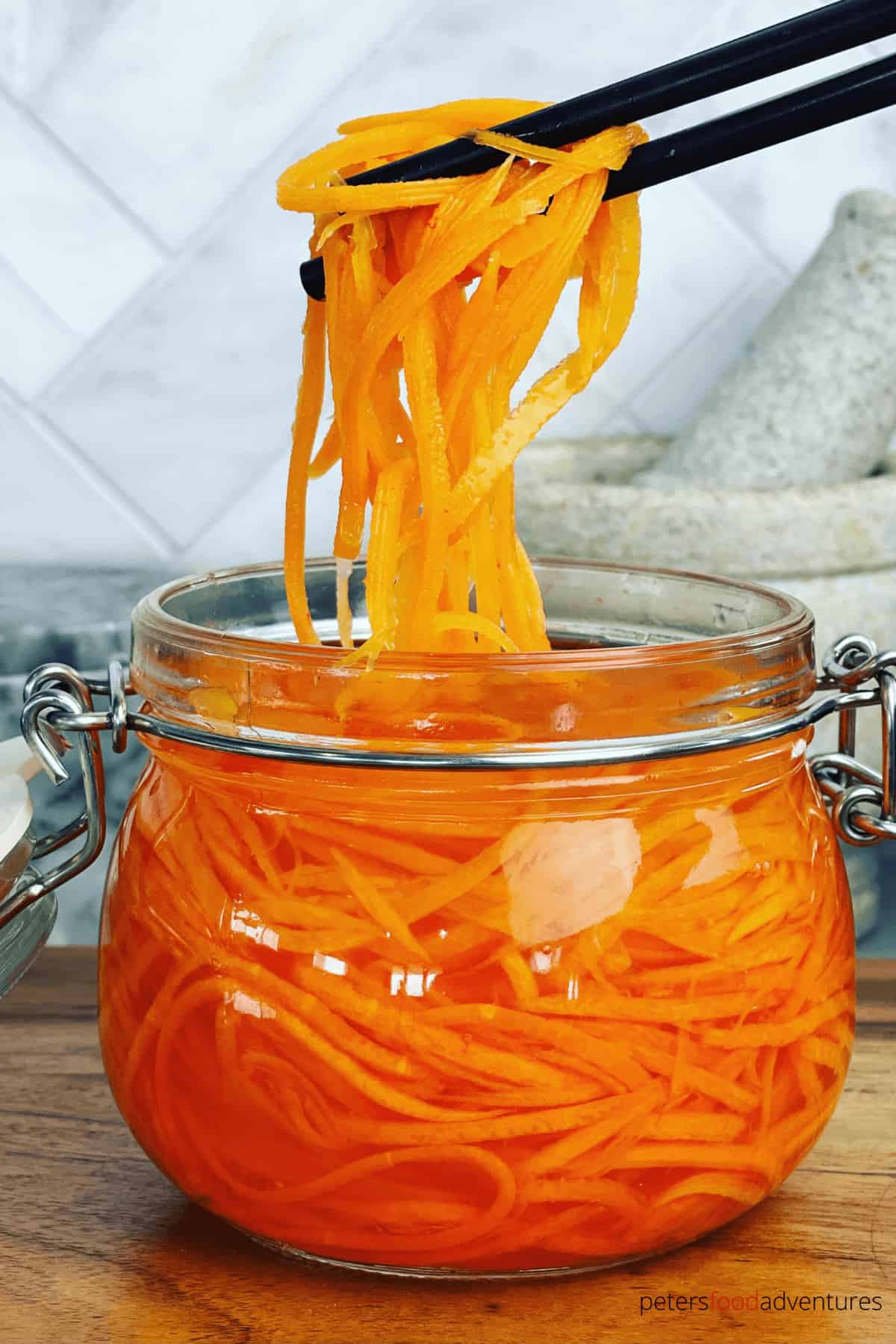 Quick Pickled Carrots recipe that's perfect for your Vietnamese Rolls or as a pickled side dish. Sweet and tangy with that vinegary pickle flavor that everyone loves. Takes only minutes to prepare!