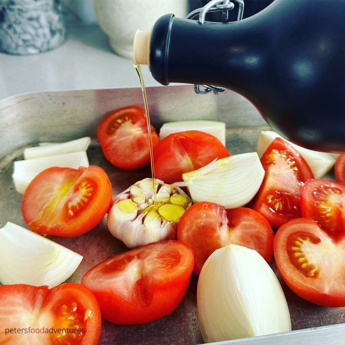 pouring oil on tomatoes